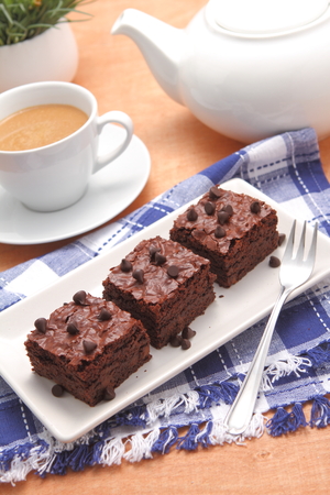 Homemade chocolate brownies served on a plateの写真素材