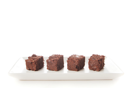 Homemade chocolate brownies served on a plateの写真素材