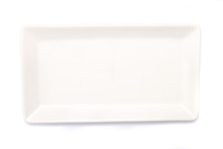 Top view of an empty rectangle white plate on white background.の写真素材