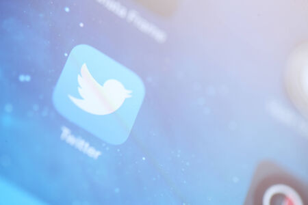 close-up of tablet with social media iconのeditorial素材