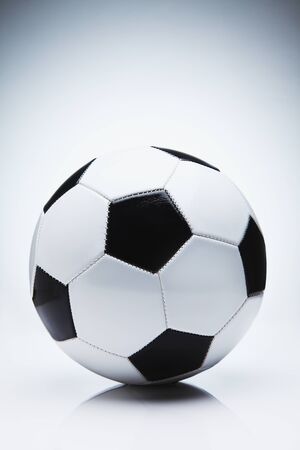 Soccer ball on isolated gradient backgroundの写真素材