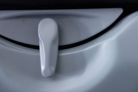 Close-up of a tray latch inside an aircraftの写真素材