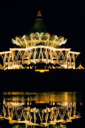 Kuching, Sarawak, Malaysia - September 2018: The new Sarawak State Assembly building (Dewan Undangan Negeri) with its distinctive "payung" (umbrella) roof is the state parliament of Sarawak.のeditorial素材
