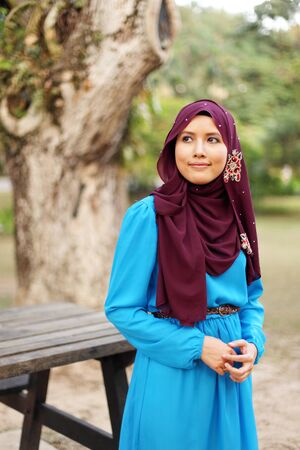 Muslim lady posing and smiling happilyの写真素材