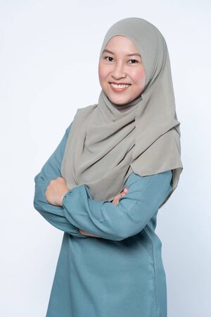 Beautiful muslim woman posing and smiling.の写真素材