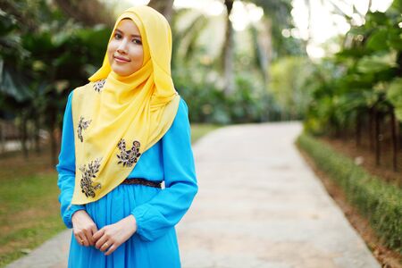 Muslim lady posing and smiling happilyの写真素材