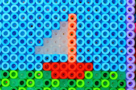Colorful plastic blocks for children to play in the playground. Background