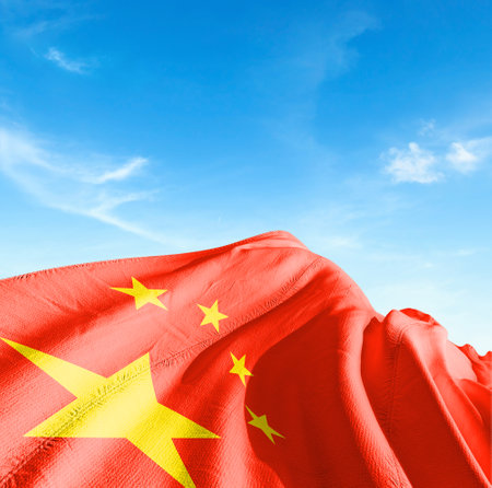 China waving flag against blue sky with copy space - 3D illustration in high qualityの写真素材