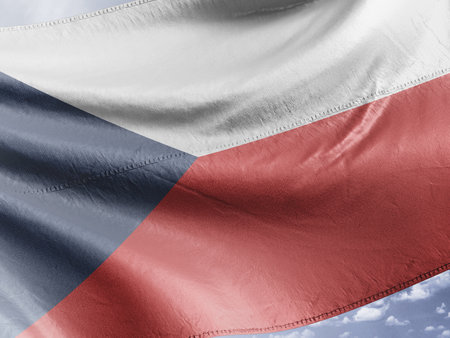 Czech Republic flag waving in the wind with blue sky background.の写真素材