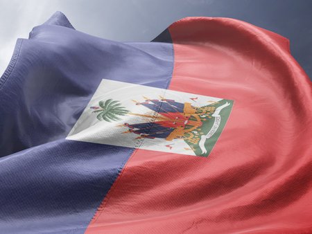 Haiti Flag waving in the wind against blue sky with cloudsの写真素材