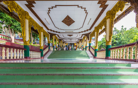 On the way to the The Kyauk Taw Gyi pagoda on top of Mindhama Hill near Yangon airport is known for its enormous Buddha image made out of a single piece of white marble.のeditorial素材