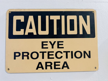 Caution Eye Protection required in this area signの写真素材