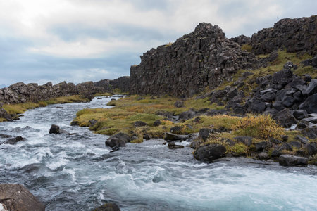 River near the Oxararfoss waterfallの写真素材