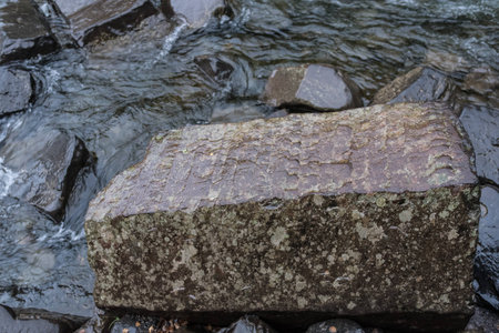 Basalt rock in the riverの写真素材