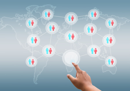 hand pushing a button on a touch screen interfaceの写真素材