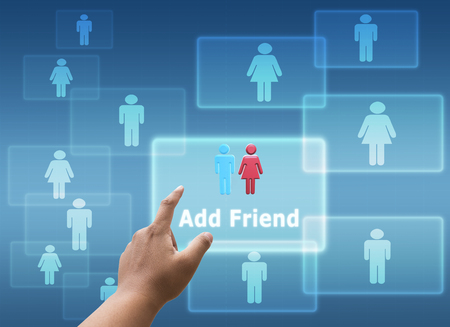 hand pushing a button on a touch screen interfaceの写真素材