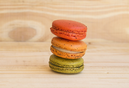 colorful macarons on wood floor with vintage pastelの写真素材