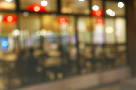 Abstract blur of restaurant with blurred light bokeh backgroundの写真素材