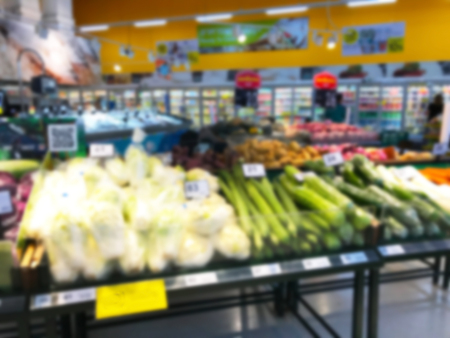 Fresh food on shelf in supermarket blurred backgroundの写真素材