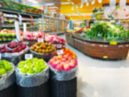 Fresh food on shelf in supermarket blurred backgroundの写真素材