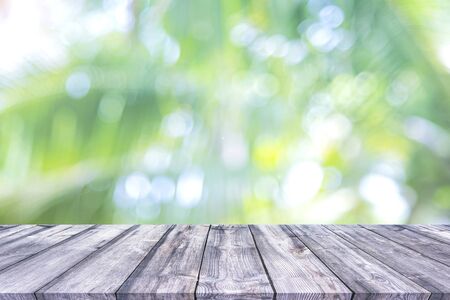 Abstract spring or summer with bokeh background and wooden tableの写真素材