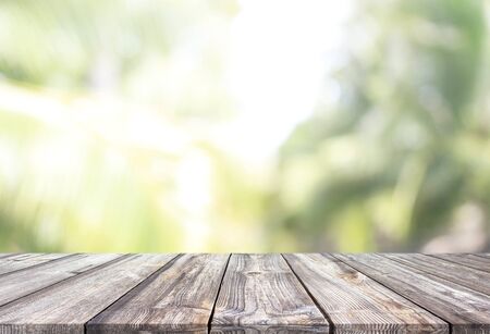 Abstract spring or summer with bokeh background and wooden tableの写真素材
