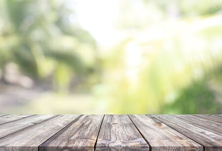 Abstract spring or summer with bokeh background and wooden tableの写真素材