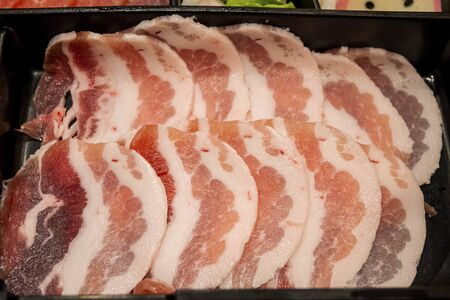 Close Up with Sliced Pork for Shabu and Sukiyakiの写真素材