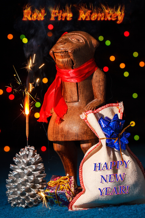 Chinese symbol of year 2016 - Red Fire Monkey with sparkler and giftsの写真素材
