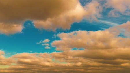 Storm clouds at sunset in the autumn evening