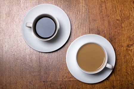 two cups of black and white coffee の写真素材