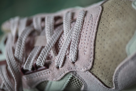 Fragment of original suede sports sneakers.の写真素材