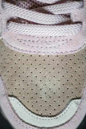 Fragment of original suede sports sneakers.の写真素材