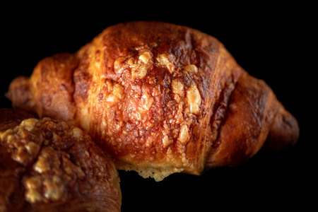 Delicious organic fresh homemade croissant on a dark background.の写真素材