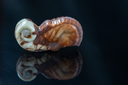 Figures of chocolate on a dark background.の写真素材
