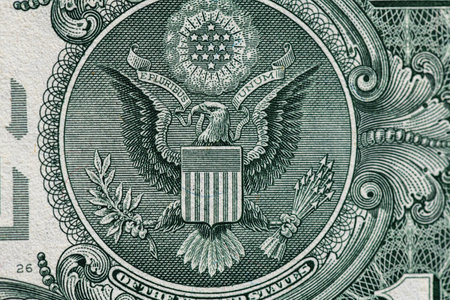 Fragment of one American dollar banknote close-up.