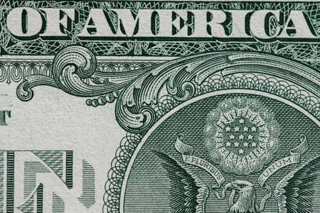 Fragment of one American dollar banknote close-up.