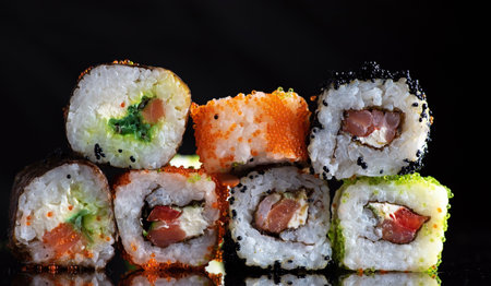 Sushi on a dark background in the studio close-up.の写真素材