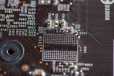 A fragment of the electronic board of the video card. Photographed close-up.の写真素材