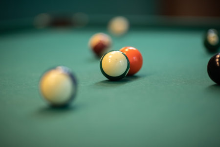 Beautiful green billiard table and balls for playing billiards.の写真素材