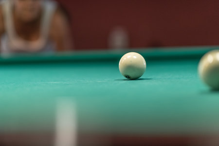 Beautiful green billiard table and balls for playing billiards.の写真素材
