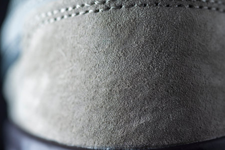 A close-up view of a textured grey surface.