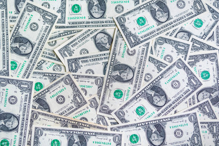 Background from one dollar banknotes. Photographed close-up.