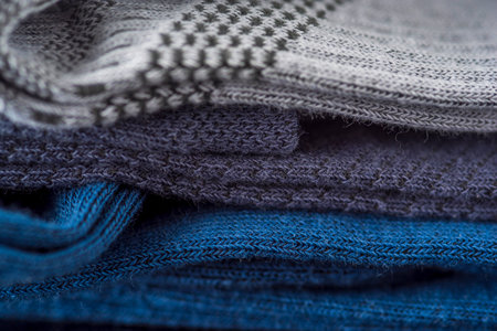 Men's socks. Photographed close-up against a dark background.
