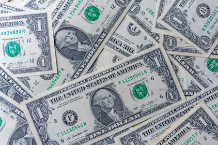 Background from one dollar banknotes. Photographed close-up.