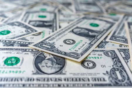 Background from one dollar banknotes. Photographed close-up.