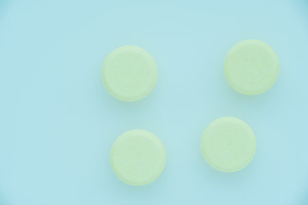 Pills on a light background close up. View from above.