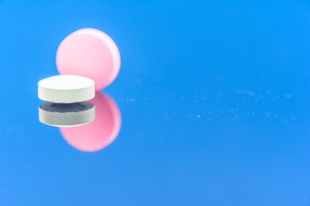 Different types of multi-colored pills. Photographed closeup of pharmaceuticals.の写真素材