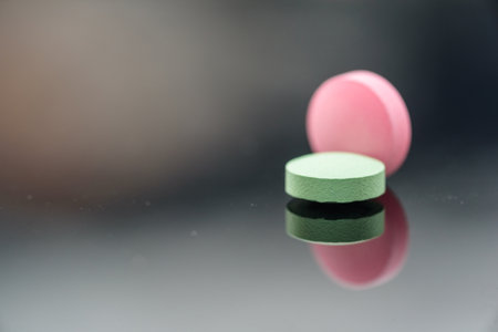 Different types of multi-colored pills. Photographed closeup of pharmaceuticals.の写真素材