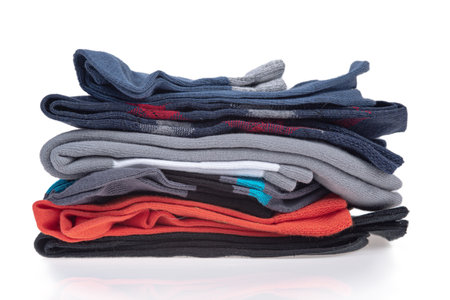 Stack of clothes isolated on white background. Clipping path included.